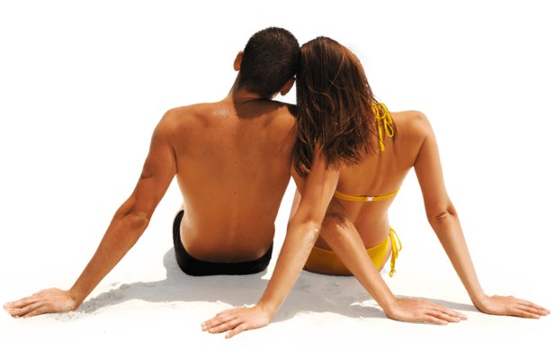 Hair Removal_72dpi A man and a woman sitting on the sand at the beach
